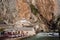 Empty cafe near the fast mountain river & ancient Sufi monastery Blagaj Tekke above