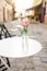 Empty cafe terrace with white table and chair. interior Street cafe.