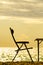 Empty camp chair and table on beach