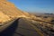 Empty car road in Negev desert near Big crater, Israel,Middle East