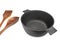 Empty Cast Iron Pot, Wooden Spatula And Serving Spoon Isolated