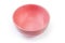 Empty ceramic pink bowl on a white background