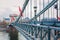 Empty Chain Bridge in Budapest is a historical architecture, famous for tourism, without any transport, with a kings emblem, natio