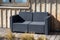 Empty chair grey seat decoration outdoor patio garden bench sofa in wooden facade house terrace