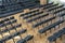 Empty chairs in the assembly hall are arranged in rows, top view