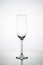 Empty champagne glass on white background. Luxury drinks glass on white background