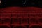 Empty cinema hall with red seats. Movie theatre.