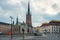 Empty city street junction in the center of Stockholm with historic buildings and the church of Riddarholmen.