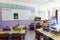 Empty Classroom In Elementary School With Whiteboard And Desks