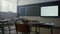 Empty classroom interior. School room with modern projector screen on wall