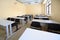 Empty classroom with wooden school desks