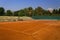 Empty clay tennis court