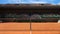 Empty clay tennis court with spectators 3d render net close-up