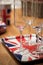 Empty clear Champagne Flute glases on a Union Jack British Flag tray