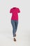 Empty clothes invisible sexy Woman wearing pink polo shirt and tight jeans with shoes posing