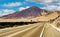 Empty coastal asphalt highway road in barren desert landscape - Panamericana, North Chile, Atacama Region