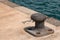 Empty coastal mooring or towing bollard for the boat, yacht or vessel