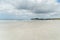 empty coastline under blue sky with clouds, Rarawa beach,