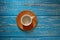 Empty coffee cup on a blue rural wooden table