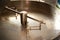 Empty coffee roaster machine with sunset light / coffee maker / copy space