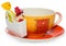 Empty coffee, tea cup with storage on candy with two sweets . Cup and saucer decorated with hearts in color yellow, orange, red. C