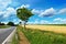 Empty countryside road before thunderstorm