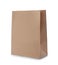 Empty craft paper bag on white. Mockup for design