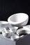 Empty crockery or ceramic dishes set. Kitchen dishware and tableware on grey near wall background