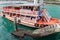 A empty cruise ship at port. Ferry passengers at pier