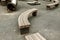 Empty curved wooden benches