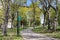 Empty Curving Trail at Astoria Park with Green Grass and Trees during Spring in Astoria Queens New York