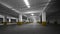 Empty dark underground parking interior