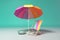 Empty deck chair with umbrella on pastel background. Sunbed, studio shot. Beach tourism, travel, relax, vacai, holiday background