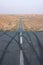 Empty desert downhill road