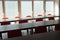 Empty desks and chairs in deserted office room