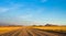 Empty dirt road across the the Namibian Desert