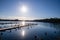 Empty docks in the port of Scharmuetzelsee, Brandenburg, Germany. Empty docks in winter under the clear sky at noon.