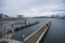 Empty docks in Valencia port, Spain. Valencia Port At Mediterranean Sea. Reflexion in the water. Empty docks in the