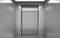 Empty elevator cabin with closed steel doors