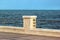 Empty embankment on sea coast with marble fence and horizon