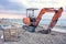 Empty excavator in front of Larnaca beach, Cyprus