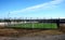 Empty fenced soccer field.