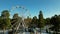 Empty Ferris wheel in the park in winter. Aerial.