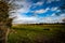 Empty field and stormy sky