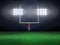 Empty football field with spotlights