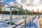 Empty Football (Soccer) Field in the Winter Partly Covered in Snow - Sunny Winter Day