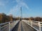 Empty footbridge on steel rope over the river Elbe