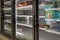 Empty freezer shelves at Publix featuring frozen food shortage including organic vegetables, pizza, and junk food during Covid-19