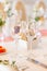 Empty glass glasses in the wedding decor on a festive Banquet table