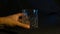 Empty glass of whiskey on a black background. Close-up.